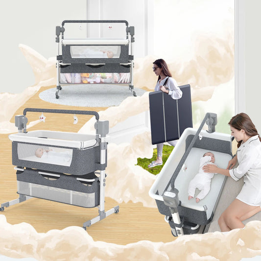 White portable rocking bedside bassinet with mesh sides