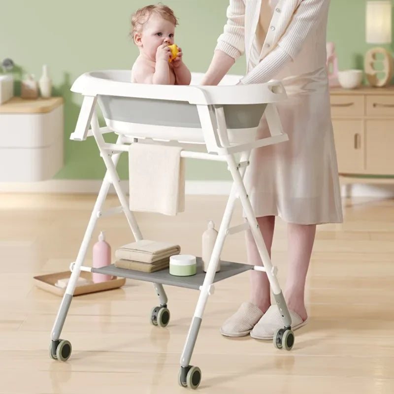 White foldable baby bath tub with adjustable stand and wheels